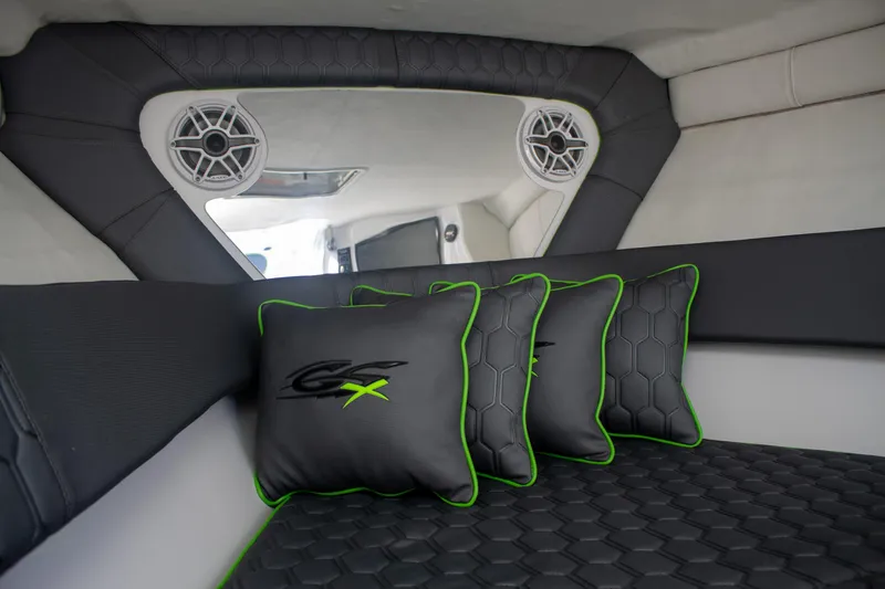 Adeline Yacht Photos Pics 2023 Glasstream 328 GS Xtreme cabin with stylish cushions and modern interior design.