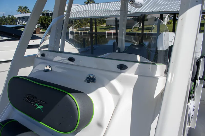 Adeline Yacht Photos Pics 2023 Glasstream 328 GS Xtreme boat console with windshield and seating.
