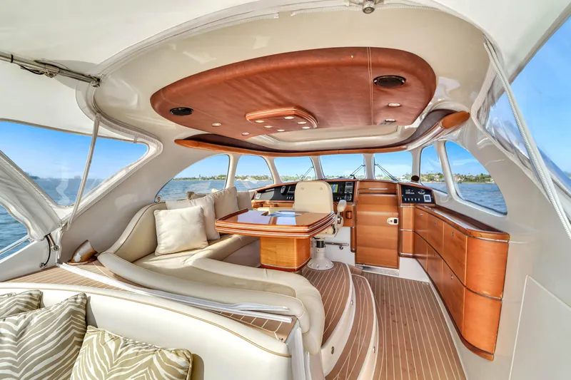 Mississippi Queen Yacht Photos Pics Luxurious interior of a 2012 Zeelander 44 yacht with elegant wood finishes and plush seating.