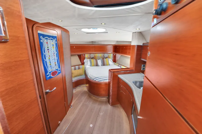 Mississippi Queen Yacht Photos Pics Luxurious interior of 2012 Zeelander 44 yacht with wood finish and cozy bedroom.