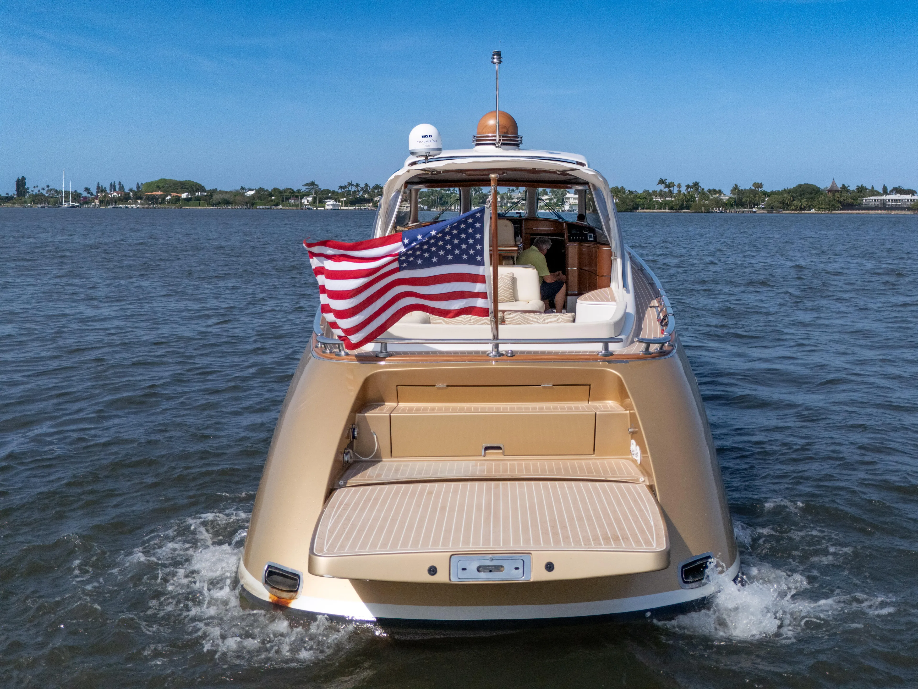 Mississippi Queen Yacht Photos Pics Luxury 2012 Zeelander 44 yacht with American flag on open water.