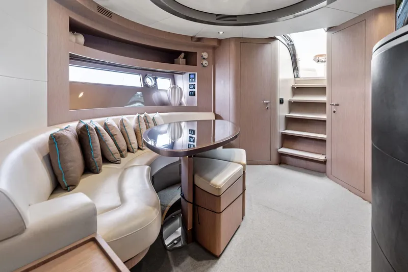 Badleship Yacht Photos Pics Luxurious interior of a 2015 Riva Rivale yacht with elegant seating and modern design.