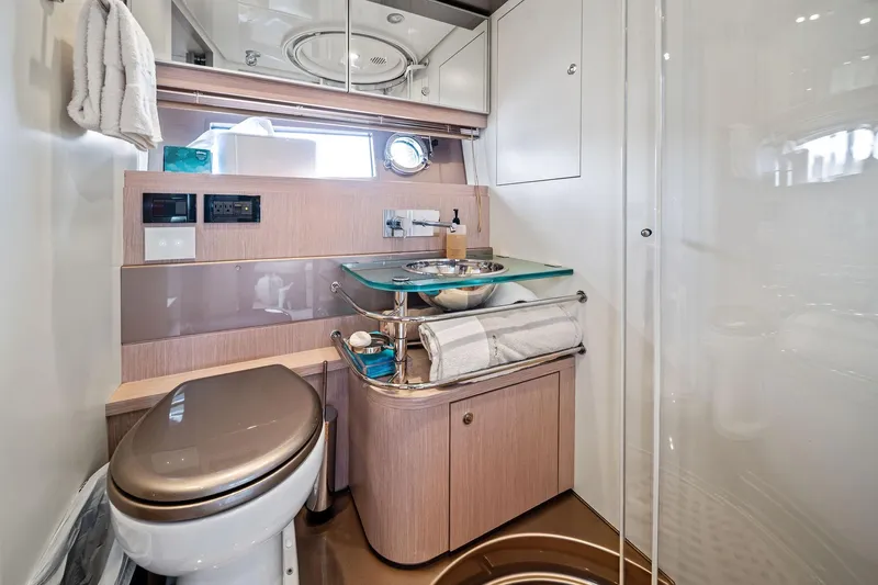 Badleship Yacht Photos Pics Luxurious 2015 Riva Rivale yacht bathroom with modern fixtures and elegant design.