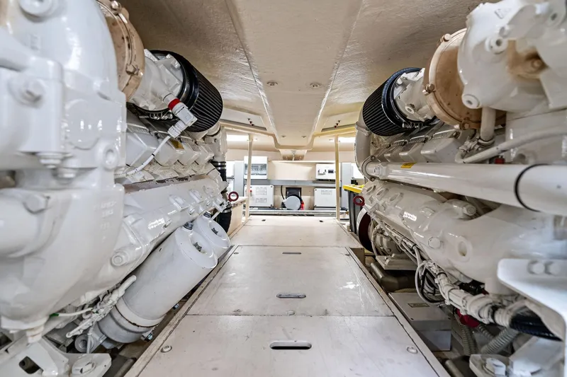 Badleship Yacht Photos Pics Engine room of a 2015 Riva Rivale yacht, showcasing dual engines and mechanical components.