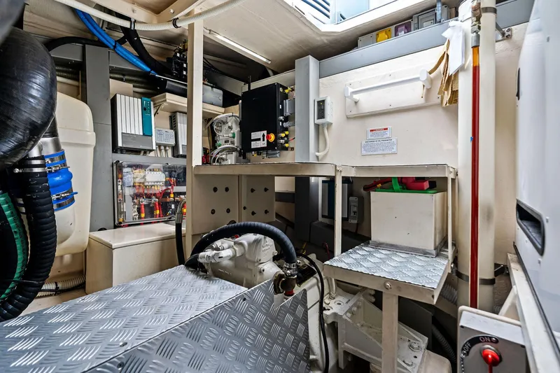 Badleship Yacht Photos Pics Engine room of a 2015 Riva Rivale yacht, showcasing mechanical and electrical components.