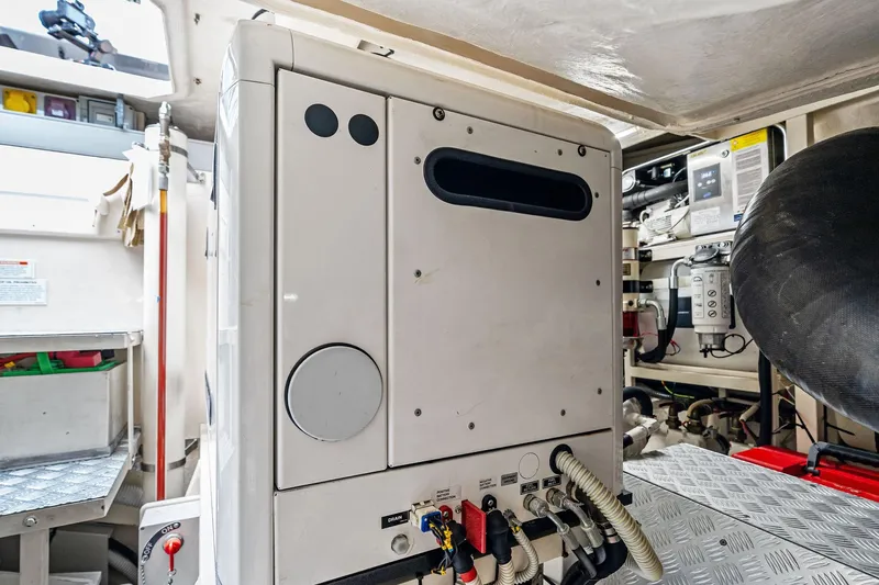 Badleship Yacht Photos Pics Engine room of 2015 Riva Rivale yacht, showcasing machinery and equipment.