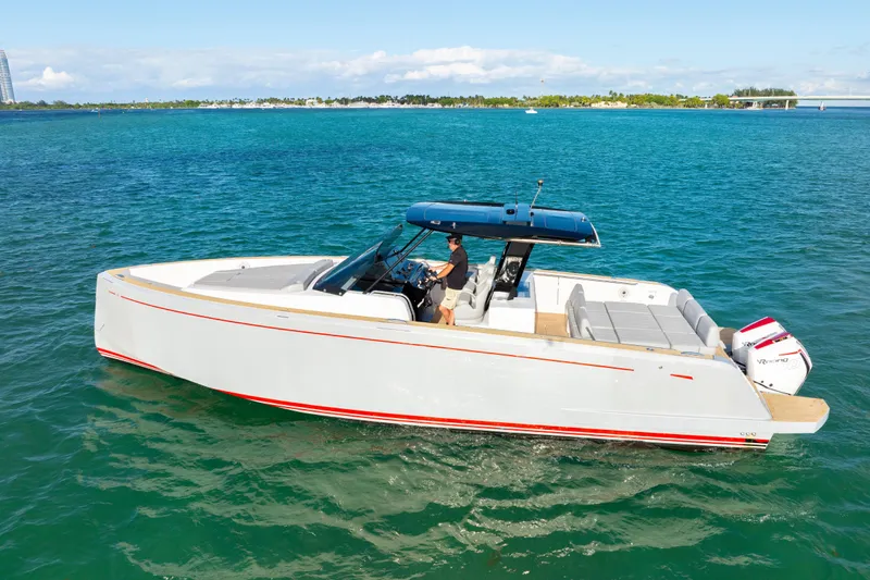  Yacht Photos Pics 2021 Pardo Yachts 38 cruising on clear blue water, showcasing sleek design and luxury features.