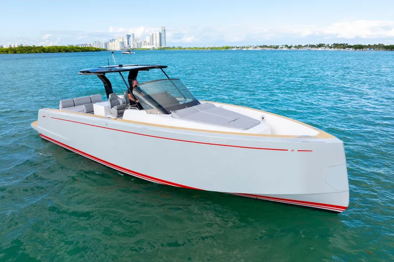  Yacht Photos Pics 2021 Pardo Yachts 38 cruising on blue water with city skyline in background.