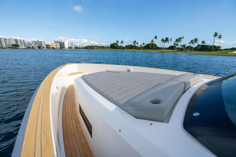  Yacht Photos Pics Luxury Pardo Yachts 38, 2021 model, cruising on serene waters with scenic cityscape.