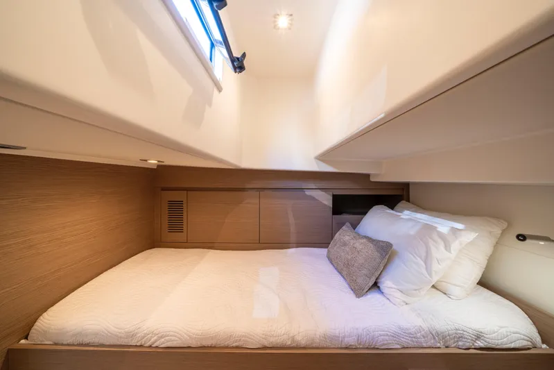  Yacht Photos Pics Luxurious cabin interior of 2021 Pardo Yachts 38 with cozy bedding and modern design.