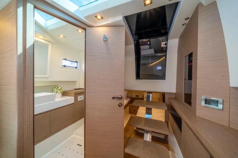  Yacht Photos Pics Luxurious interior of 2021 Pardo Yachts 38, featuring modern wood finishes and elegant design.