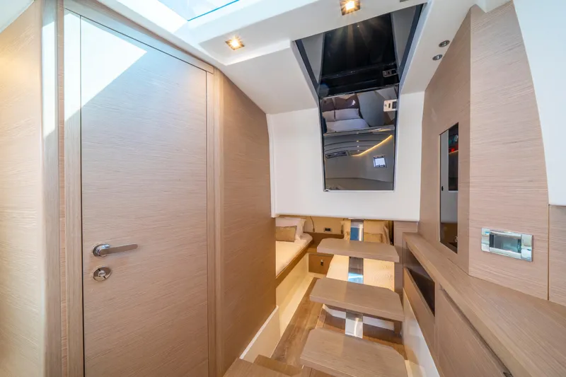  Yacht Photos Pics Luxurious interior of 2021 Pardo Yachts 38, featuring modern wood finishes and sleek design.