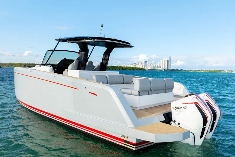  Yacht Photos Pics 2021 Pardo Yachts 38 on water, sleek design, twin engines, city skyline in background.