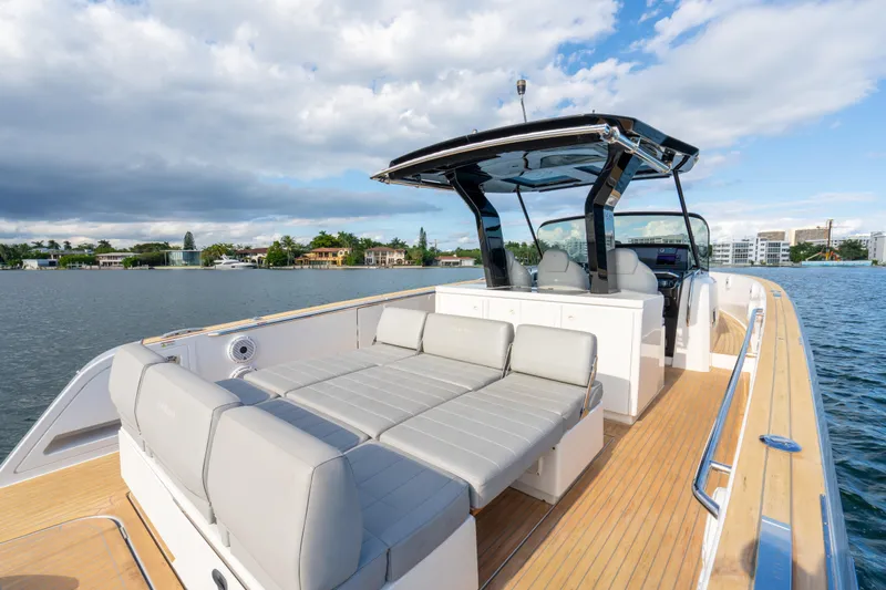  Yacht Photos Pics 2021 Pardo Yachts 38 on water, featuring spacious deck and modern seating.