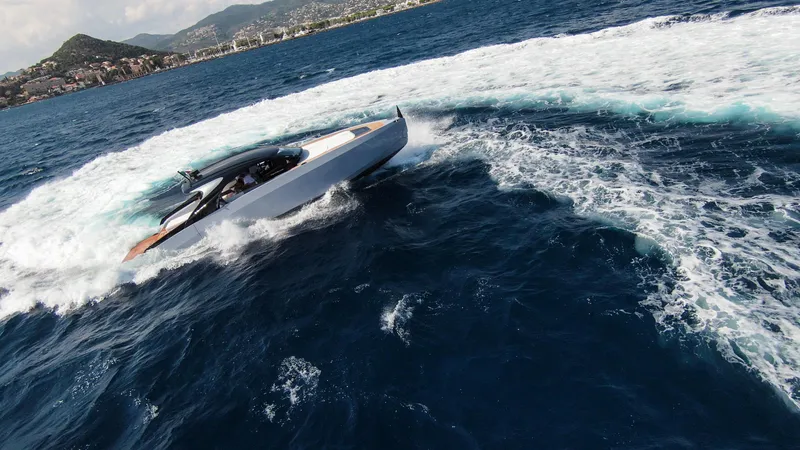 Vespro 55 Yacht Photos Pics 2026 Centouno Navi VESPRO yacht cruising on open sea with scenic coastal backdrop.