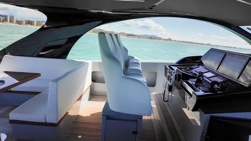 Vespro 55 Yacht Photos Pics Luxurious 2026 Centouno Navi VESPRO yacht interior with sleek seating and advanced navigation controls.