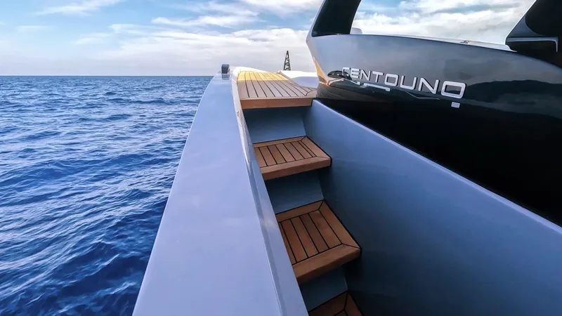 Vespro 55 Yacht Photos Pics Luxury yacht Centouno Navi VESPRO 2026 on open sea with wooden steps.