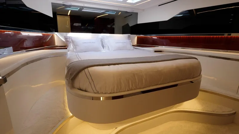 Vespro 55 Yacht Photos Pics Luxurious bedroom interior of 2026 Centouno Navi VESPRO yacht, featuring modern design and ambient lighting.