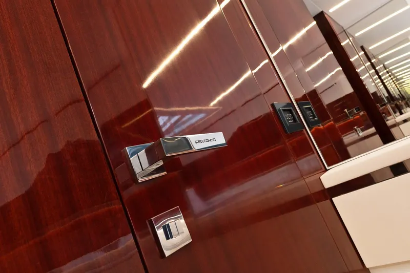 Vespro 55 Yacht Photos Pics Luxurious interior of Centouno Navi VESPRO 2026 yacht with sleek wooden finish and modern fixtures.