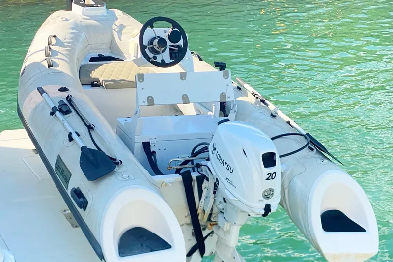 Nauti Boxer Yacht Photos Pics Inflatable boat with Tohatsu motor on a 2003 Silverton 453 Motor Yacht.