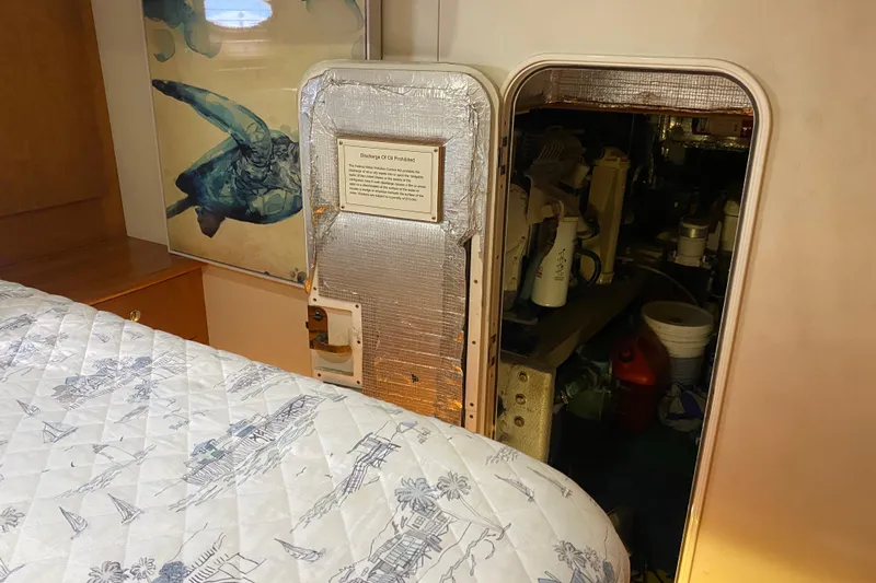 Nauti Boxer Yacht Photos Pics 2003 Silverton 453 Motor Yacht interior with engine room access door.