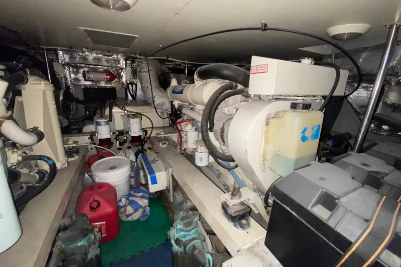 Nauti Boxer Yacht Photos Pics Engine room of a 2003 Silverton 453 Motor Yacht, showcasing machinery and equipment.