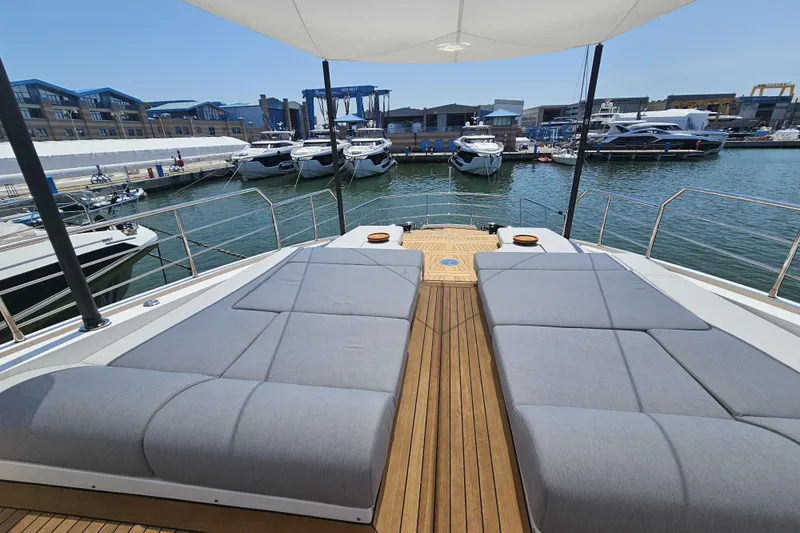 Dream Yacht Photos Pics Luxurious 2024 Azimut Grande 32 Metri yacht with spacious sun deck at marina.