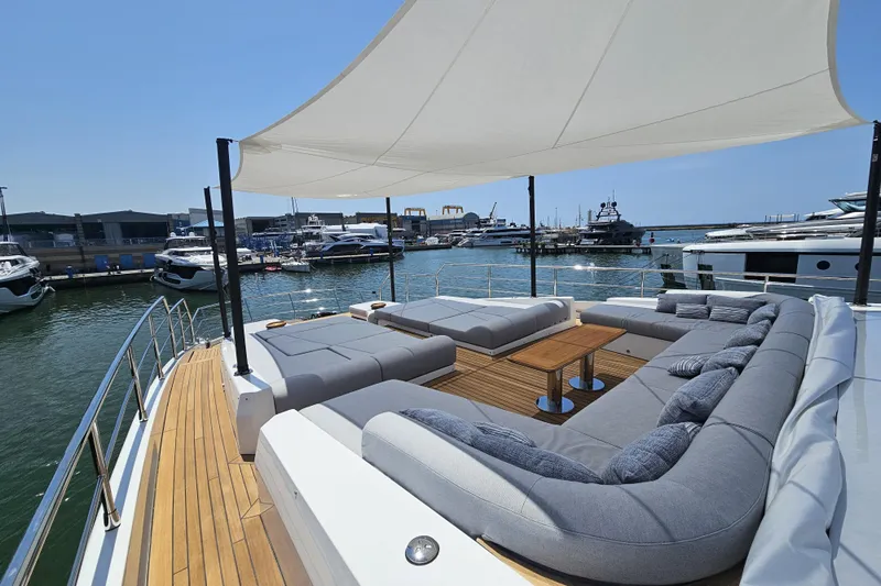 Dream Yacht Photos Pics Luxurious 2024 Azimut Grande 32 Metri yacht with spacious deck and elegant seating area.