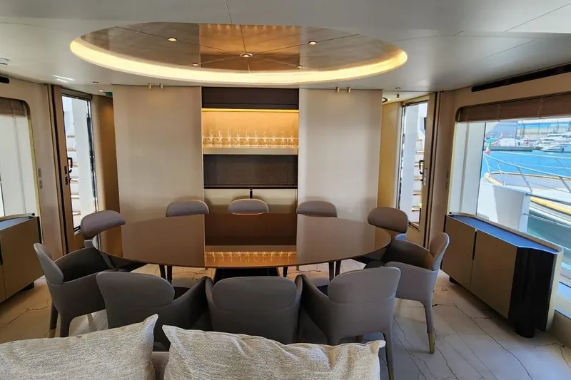 Dream Yacht Photos Pics Luxurious interior of 2024 Azimut Grande 32 Metri yacht with elegant dining area.