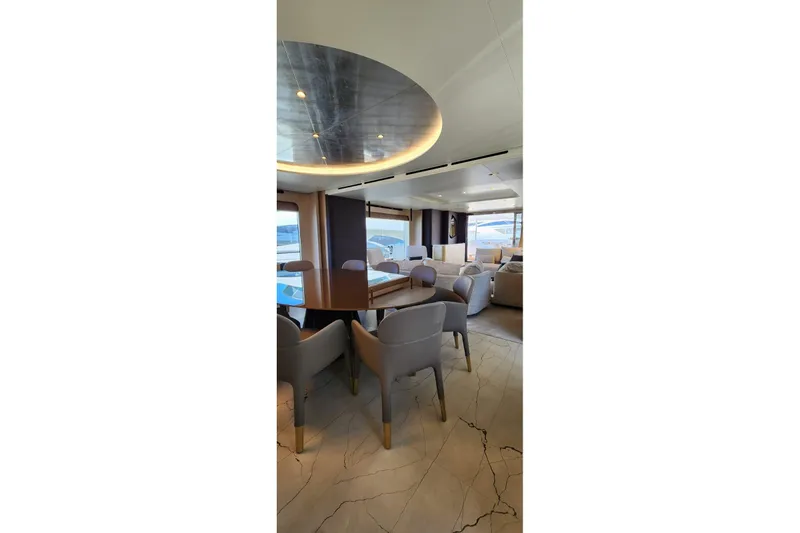 Dream Yacht Photos Pics Luxurious interior of 2024 Azimut Grande 32 Metri yacht with elegant dining area.