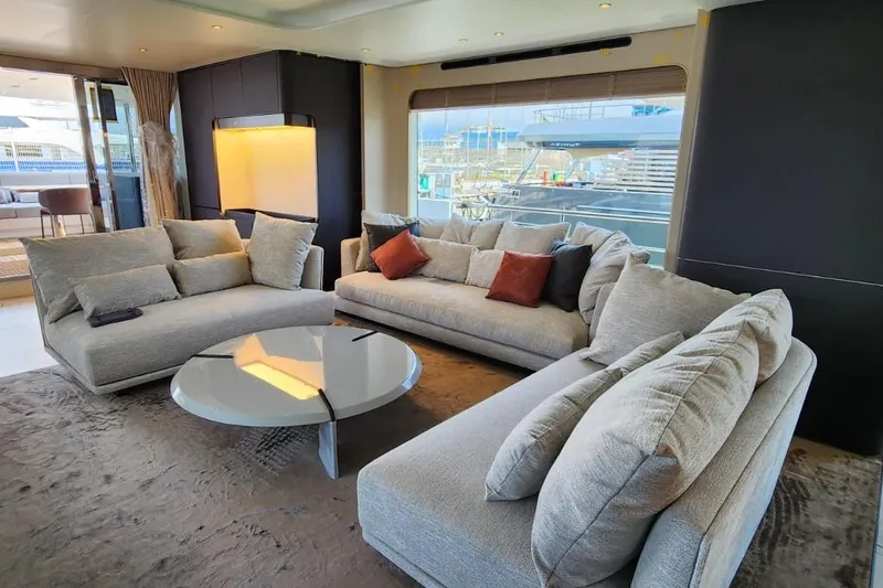 Dream Yacht Photos Pics Luxurious interior of 2024 Azimut Grande 32 Metri yacht with modern sofas and table.
