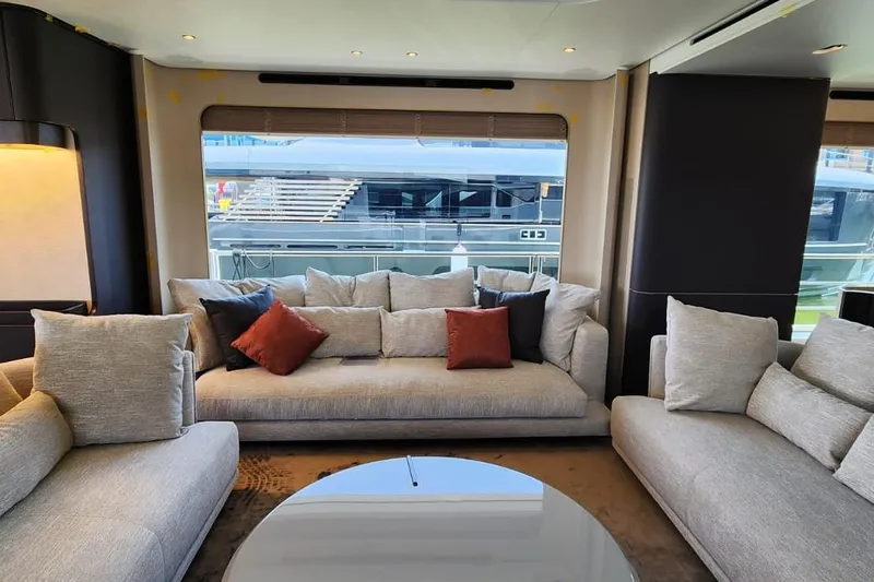 Dream Yacht Photos Pics Luxurious interior of 2024 Azimut Grande 32 Metri yacht with plush seating and elegant decor.