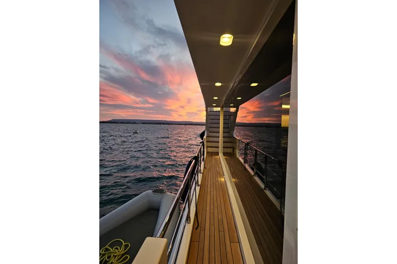 Dream Yacht Photos Pics Azimut Grande 32 Metri yacht deck at sunset, 2024 model, ocean view.