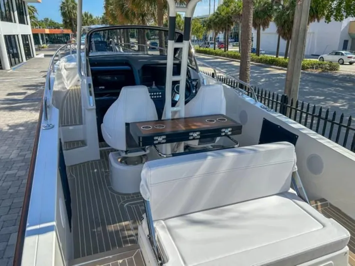  Yacht Photos Pics 2024 Windy SR28 CC boat interior with white seating and modern dashboard.