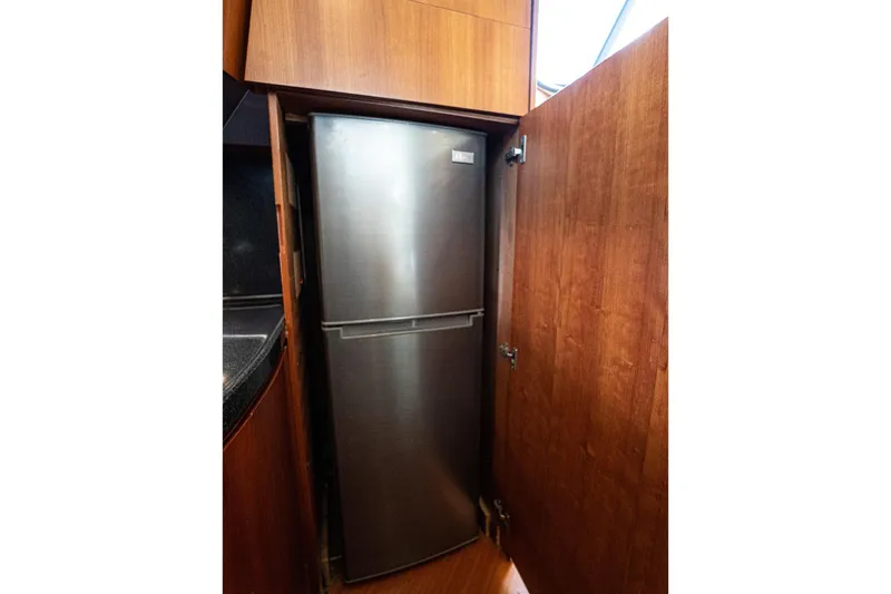 360 Yacht Photos Pics Stainless steel refrigerator in 2008 Azimut 50 Flybridge yacht kitchen.