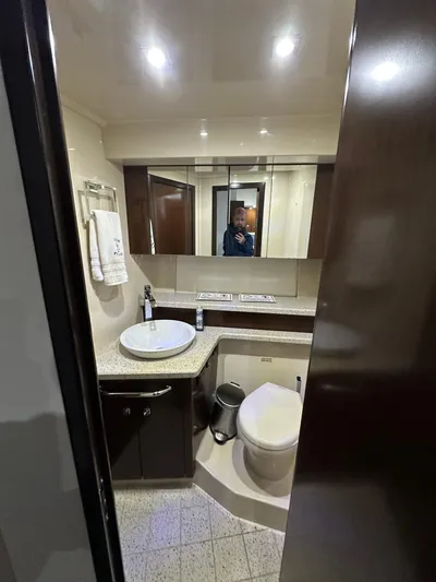Radical Physics Yacht Photos Pics Bathroom interior of 2012 Cruisers Yachts 48 Cantius with modern fixtures and lighting.