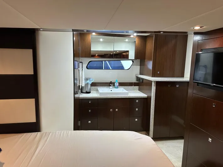 Radical Physics Yacht Photos Pics Luxurious interior of 2012 Cruisers Yachts 48 Cantius with modern cabinetry and sleek design.
