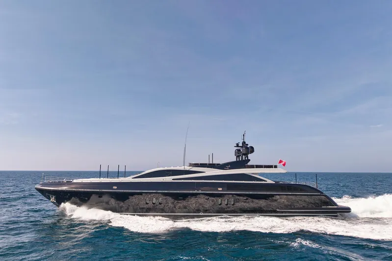 Ability Yacht Photos Pics Luxurious 2007 Codecasa 41S yacht cruising on open sea under clear blue sky.