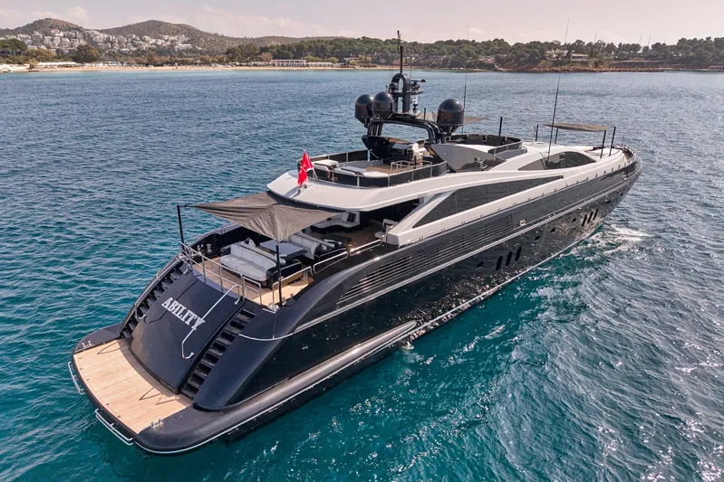 Ability Yacht Photos Pics Luxurious 2007 Codecasa 41S yacht cruising in clear blue waters.