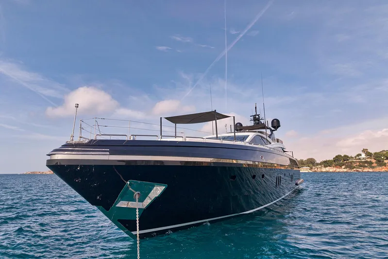 Ability Yacht Photos Pics Luxury Codecasa 41S yacht from 2007 on serene blue waters under a clear sky.