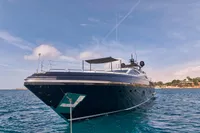 Luxury Codecasa 41S yacht from 2007 on serene blue waters under a clear sky.