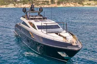 Luxurious 2007 Codecasa 41S yacht on clear blue water, showcasing sleek design and elegance.