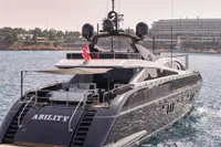 Luxury Codecasa 41S yacht from 2007, named "Ability," docked in a serene harbor.