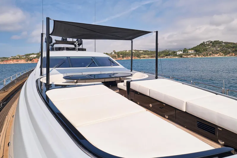 Ability Yacht Photos Pics Luxurious 2007 Codecasa 41S yacht with sunbathing deck, anchored near scenic coastline.