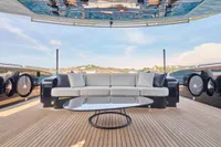 Luxurious Codecasa 41S yacht deck with modern seating and sleek table, 2007 model.