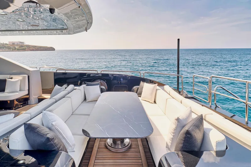 Ability Yacht Photos Pics Luxurious Codecasa 41S yacht deck with elegant seating, ocean view, and modern design, 2007 model.