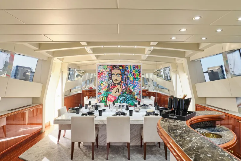 Ability Yacht Photos Pics Luxurious dining area on a 2007 Codecasa 41S yacht with modern art decor.