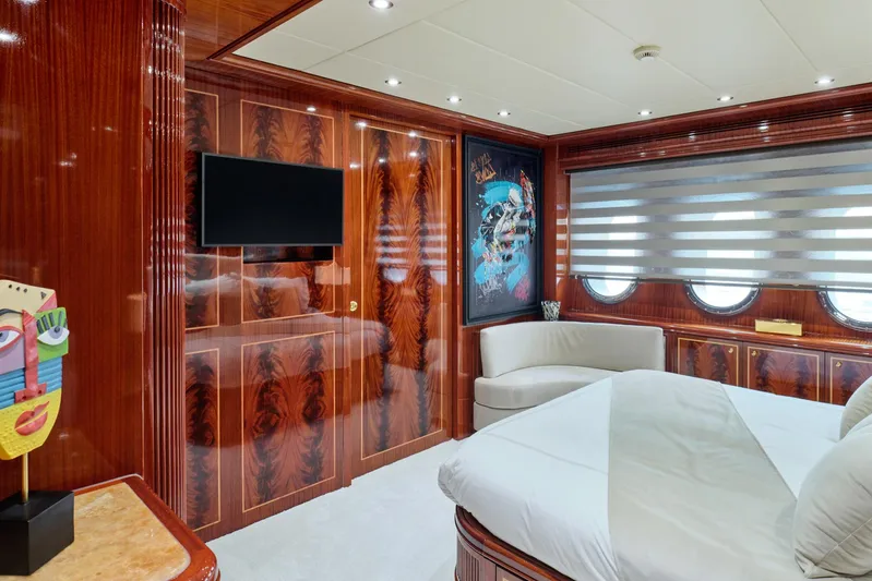 Ability Yacht Photos Pics Luxurious bedroom interior on 2007 Codecasa 41S yacht with elegant wood paneling.