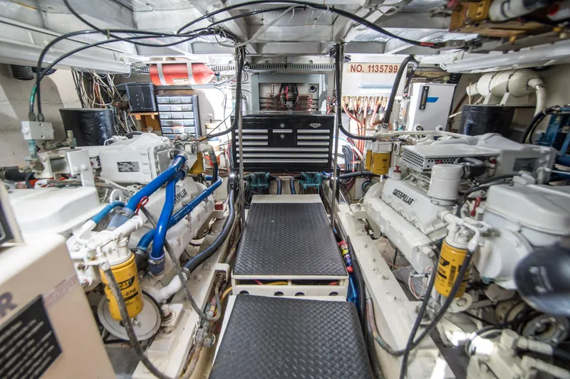 Coda Yacht Photos Pics Engine room of 1989 Californian 55 Cockpit Motor Yacht with dual engines and equipment.