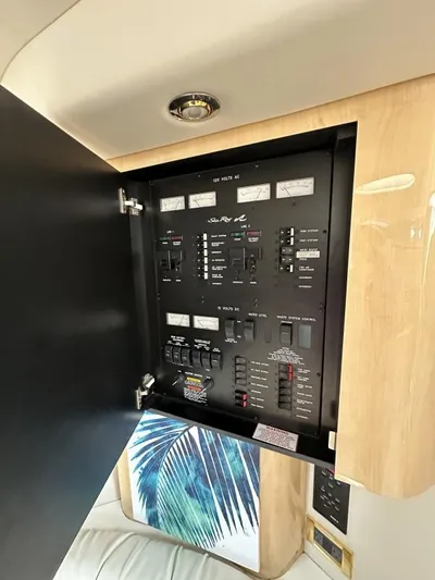No Tan Lines Yacht Photos Pics Electrical control panel inside a 2000 Sea Ray 410 Sundancer yacht.